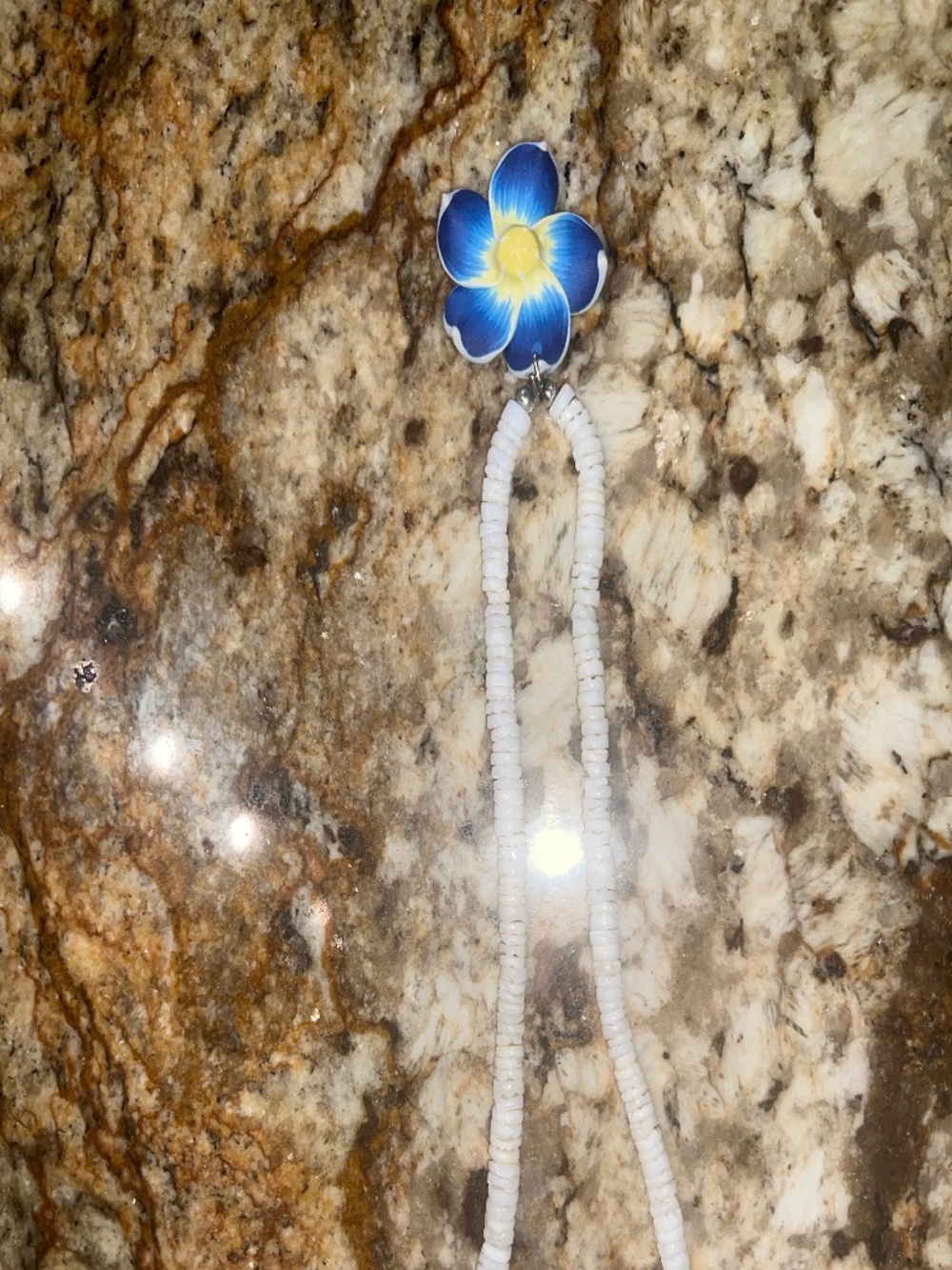 Hawaiian-Inspired White Bead Necklace with Blue Plumeria Flower